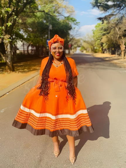 V-neck belted midi dress in bright orange with striped hem bands