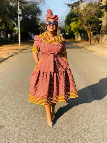 Patterned ruffle midi dress with short sleeves, round neck, maroon print and yellow trim