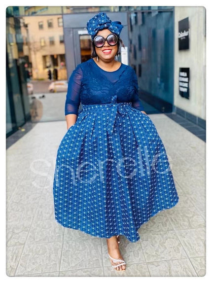 Geometric lace midi dress in navy-blue with 3/4 sleeves and pleated flared skirt