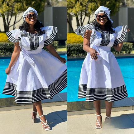 White striped midi dress with ruffle hem and puff sleeves