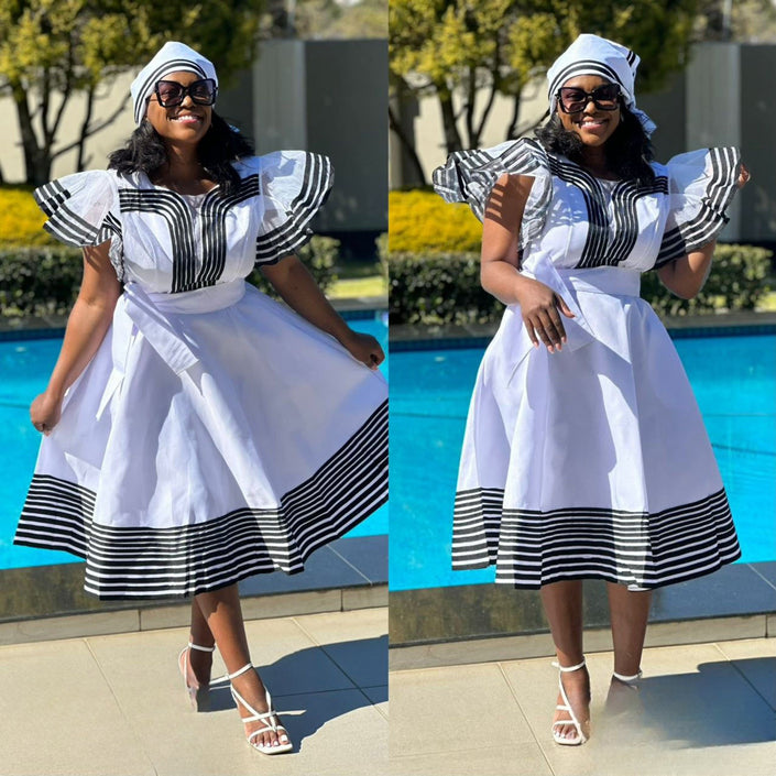 White striped midi dress with ruffle hem and puff sleeves
