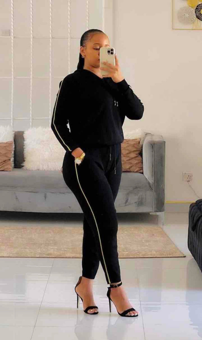 Black hoodie and jogger pant set with white side stripe detail