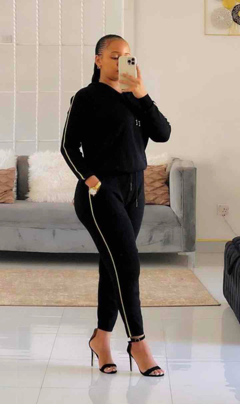 Black hoodie and jogger pant set with white side stripe detail
