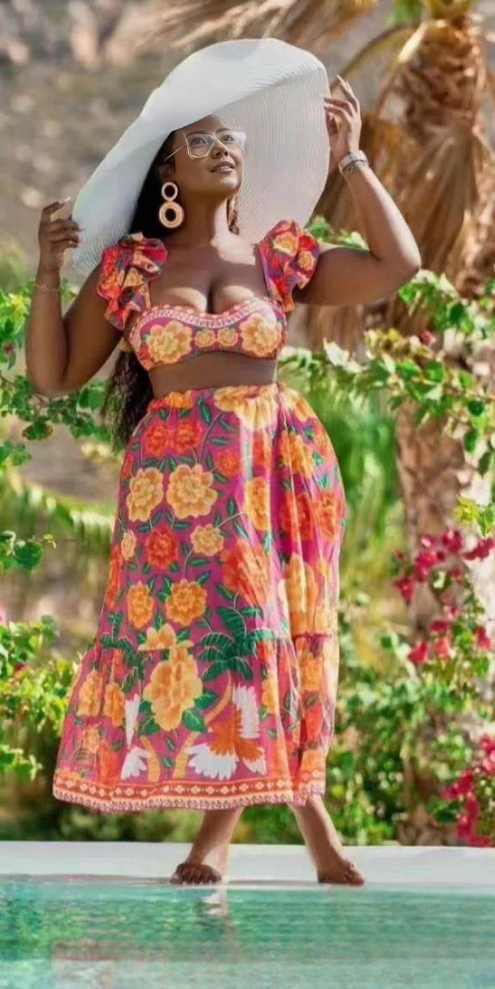 Floral off-shoulder midi dress with ruffled sleeve details, bright multicolor print