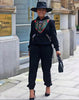 Black twin set with African print V-neck panel and matching jogger pants, long sleeves.