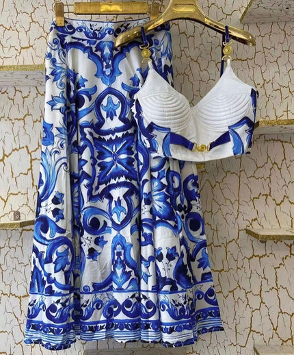 Printed skirt and ruched top on hangers, blue-and-white ornate pattern with white bodice