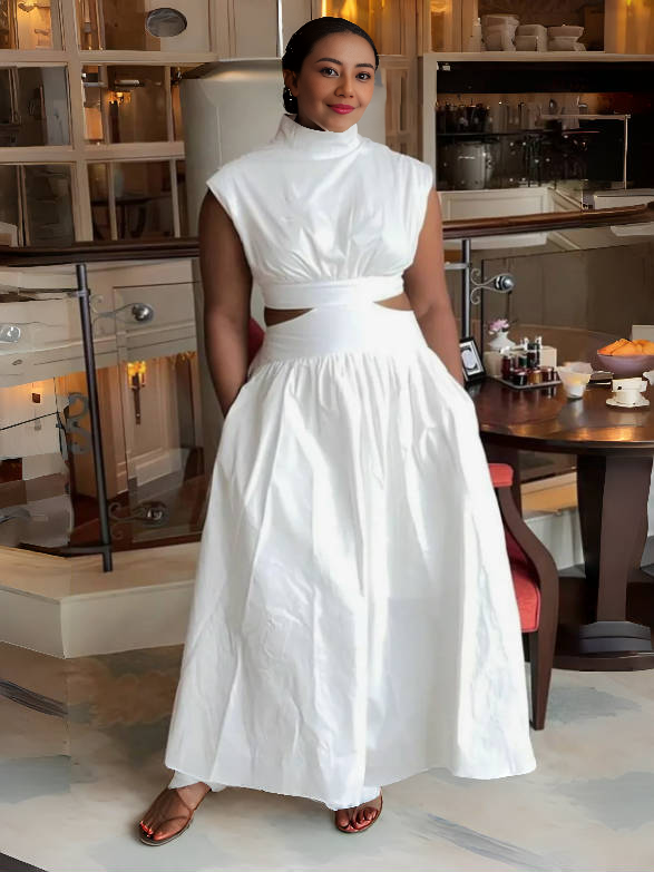 White sleeveless high-neck midi dress with waist cut-out, flared A-line skirt