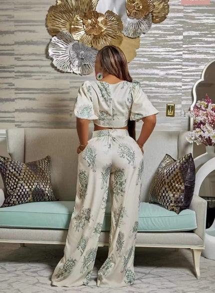 Floral twin set with puff sleeves and matching wide-leg pants, light background