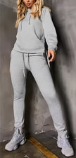 Light gray hoodie and jogger set with drawstring hood and cuffed tapered pants