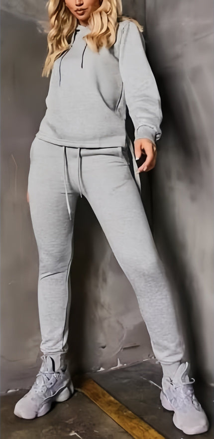 Light gray hoodie and jogger set with drawstring hood and cuffed tapered pants