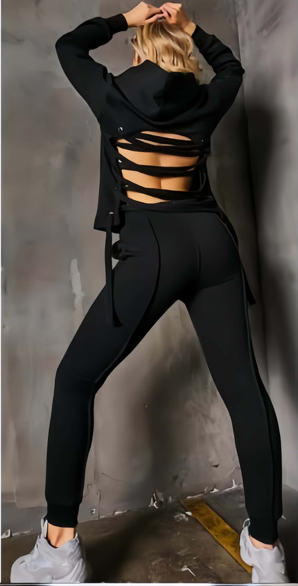 Black hoodie and jogger set with crisscross lace-back detail and drawstring hood