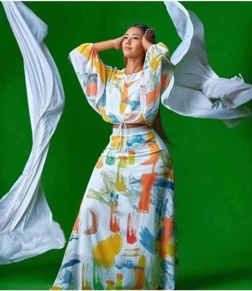 Printed top and skirt set with puff sleeves, cropped waist, colorful abstract pattern