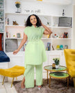 Light-green pleated top and wide-leg pants twin set with adjustable waist tie