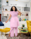 Light-pink pleated top and wide-leg pants twin set with adjustable waist tie