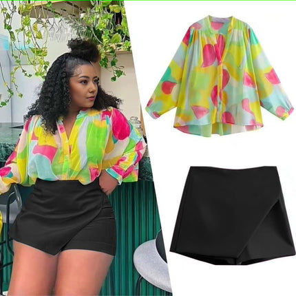 Black high-waist wrap skirt with angled front overlap, short length