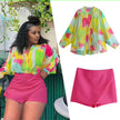 Fuchsia pink high-waist wrap skirt with angled front overlap, short length