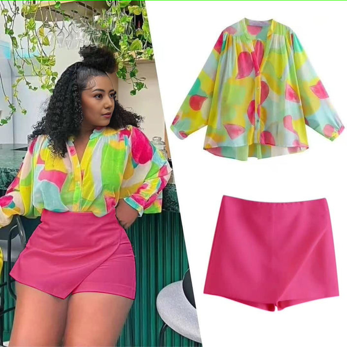 Fuchsia pink high-waist wrap skirt with angled front overlap, short length
