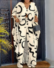 Cream V-neck top and wide-leg pants set with black abstract print