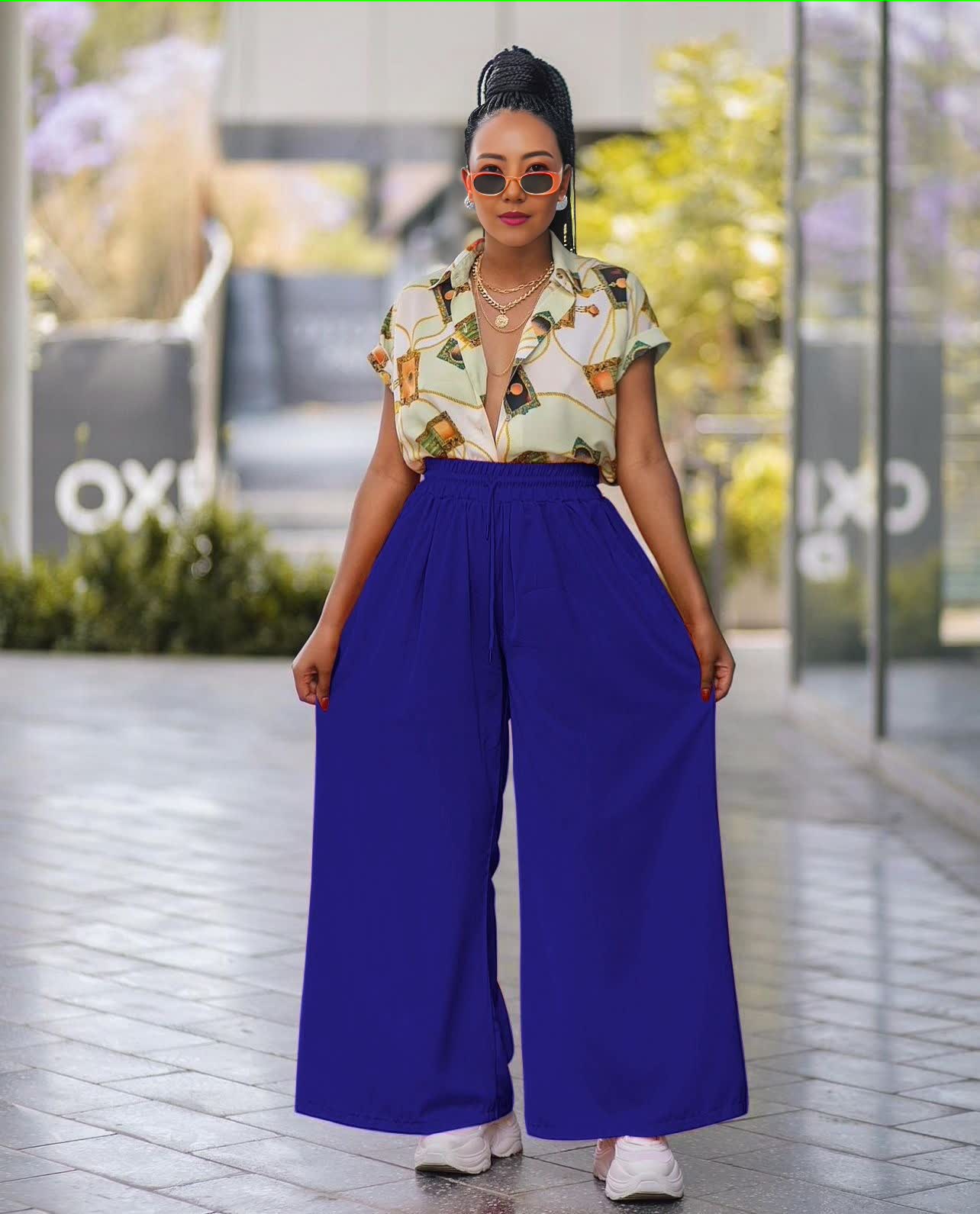 Tropical print twin set with short-sleeve shirt and royal blue wide-leg pants