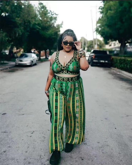 Green printed sleeveless V-neck pantsuit with waist tie and wide-leg trousers