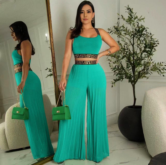 Green pleated crop pants with Greek-style trim waistband and wide legs