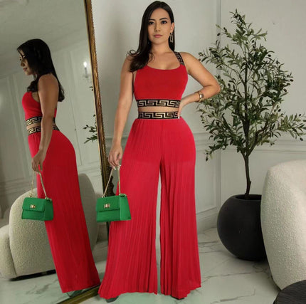 Red pleated crop pants with elastic waist and wide flowing legs