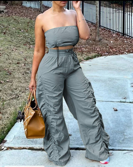 Grey strapless two-piece set with drawstring waist and wide-leg pants