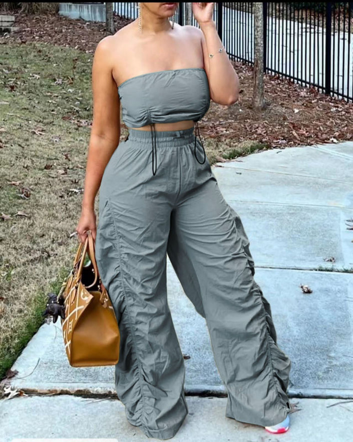 Grey strapless two-piece set with drawstring waist and wide-leg pants