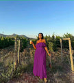Purple off-shoulder maxi dress with ruffle neckline and tiered skirt