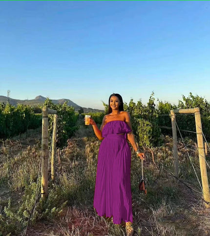 Purple off-shoulder maxi dress with ruffle neckline and tiered skirt