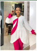 White asym hem top with draped fuchsia panel and fitted fuchsia trousers