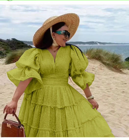 Green-yellow tiered midi dress with puff sleeves and V-neck