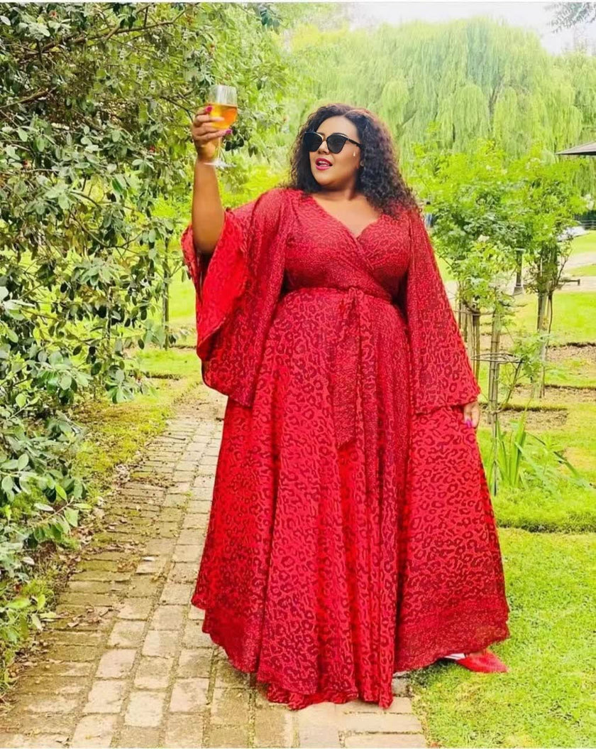 Elegant V-Neck Gown with Billowy Sleeves and Cinched Waist Detail