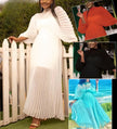 White pleated maxi dress with cinched waist, long sleeves, high neckline