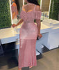 Pink sequin off-shoulder maxi dress with fringe detail, mermaid fitted hem