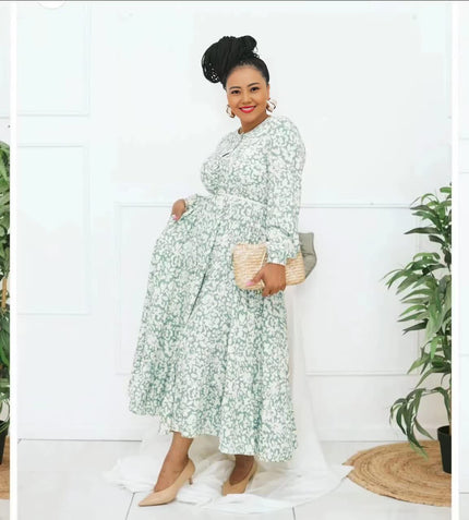 Light-green floral maxi dress with long sleeves and tiered skirt