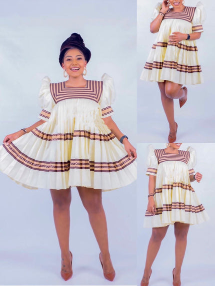 Cream mini dress with puff sleeves, striped yoke, tiered ruffled pleated skirt