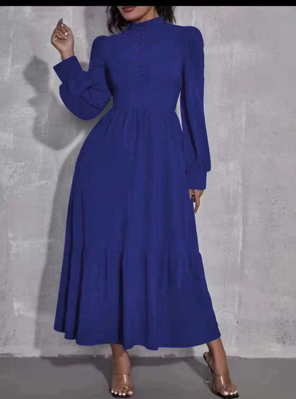 Blue midi dress with puff sleeves, button front, and tiered skirt