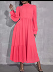 Bright pink midi dress with puff sleeves, button front, and tiered skirt
