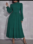 Dark-green midi dress with puff sleeves, button front, and tiered skirt