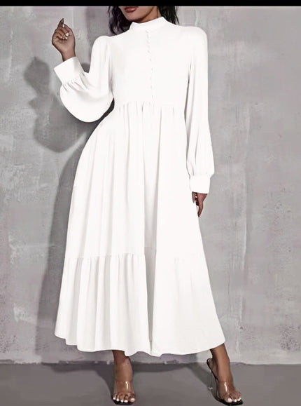 White midi dress with puff sleeves, button front, and tiered skirt