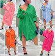 Oversized button-front shirt dress with pointed collar and long sleeves, midi length
