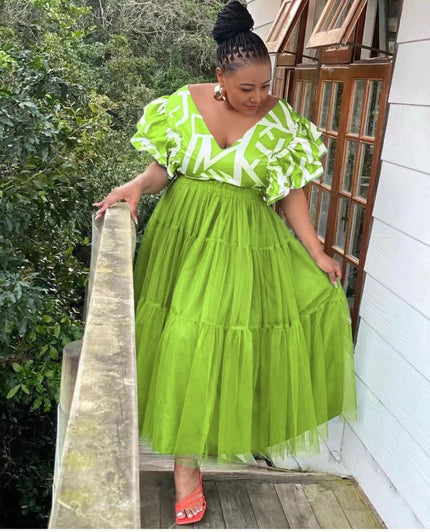 Lime-green tiered tulle maxi dress with puff sleeves and white patterned V-neck trim