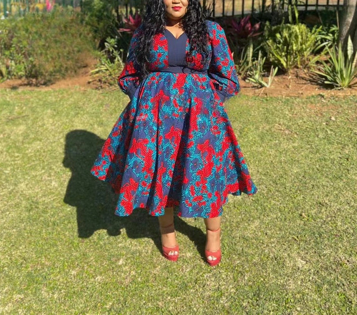Printed midi dress with puff sleeves, blue base and red floral pattern