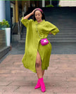 Lime yellow oversized midi shirt dress with pointed collar, button front, side slit.