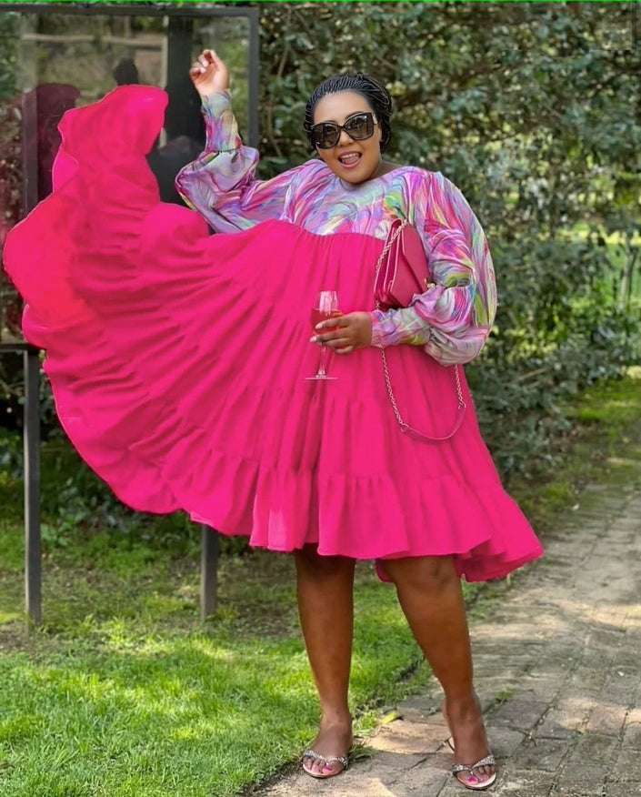 Plus size deep pink pleated midi dress with bishop sleeves and gathered waist