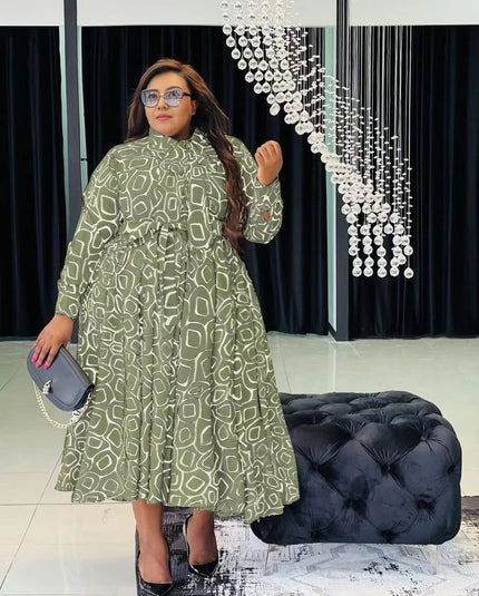 Belted flare midi dress in green with geometric print, long sleeves and high neck