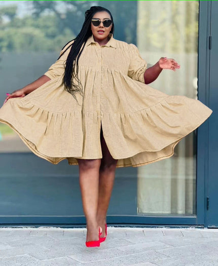 Peach ruffle-hem shirt dress with button front and tiered skirt, long sleeves
