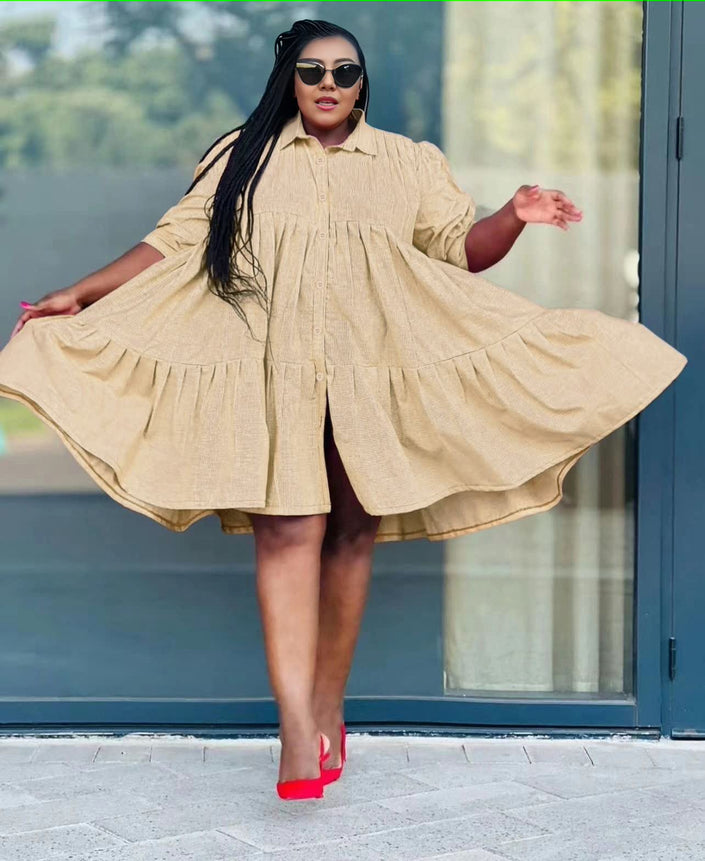 Peach ruffle-hem shirt dress with button front and tiered skirt, long sleeves