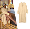Beige midi shirt dress with V-neck, button placket, three-quarter sleeves.